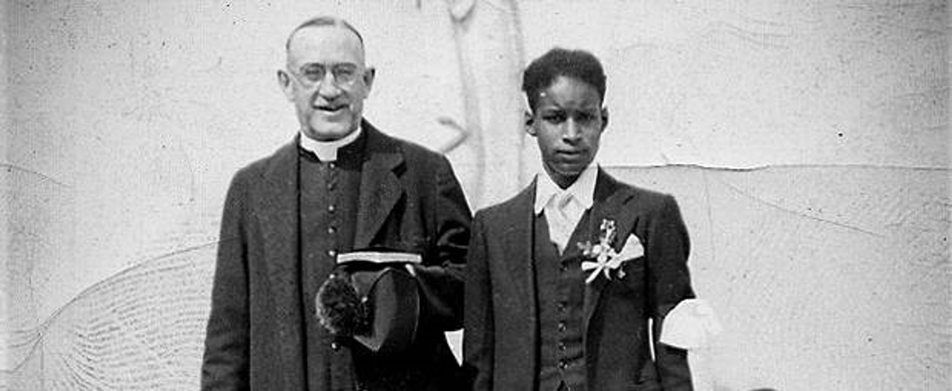web-monignor-bernard-j-quinn-with-children-msgr-paul-jervis-fair-use.jpg