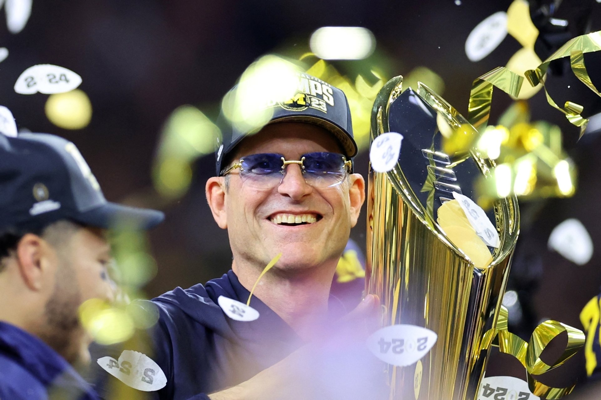 Head coach Jim Harbaugh of the Michigan Wolverines celebrates after defeating the Washington Huskies during the 2024 CFP National Championship game