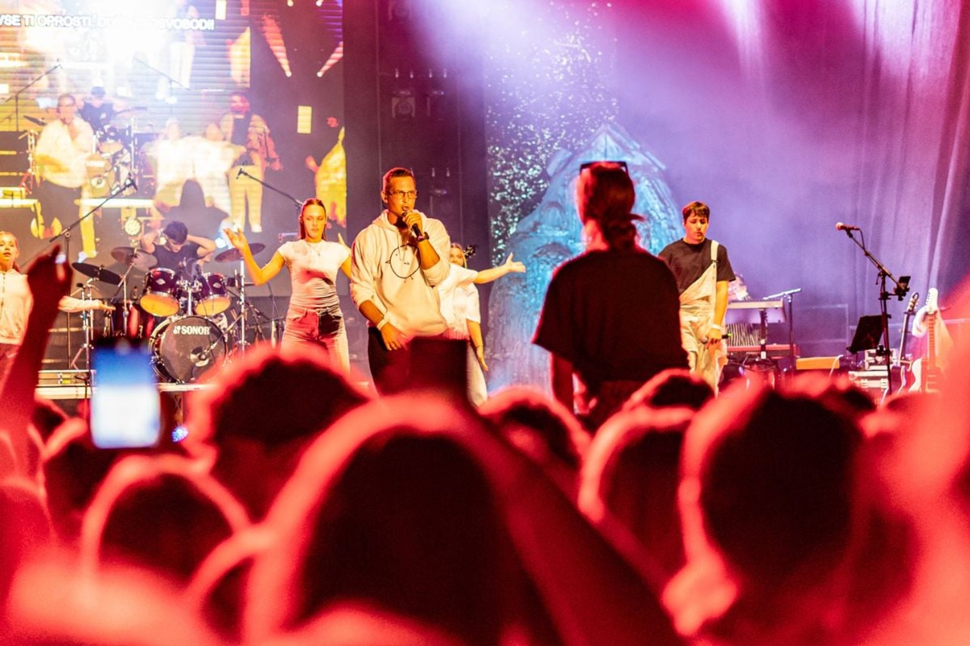 Rapper Cezar rapping on stage of a festival