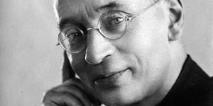 The “short priest with the cigar” who was killed at Dachau