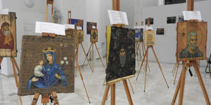 “Icons on Ammo Boxes”: Art bringing life from death