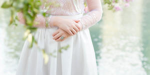 A wedding dress made from the silk of the parachute that saved the groom