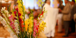 A priest, an archangel, and a swarm of honey bees