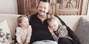 Man with double arm transplant able to hug his grandchildren again