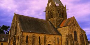 1st town liberated on D-Day and the priest who visits every year