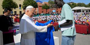 What did Pope say about migrants learning language, respecting law?