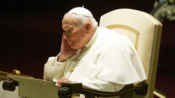 VATICAN CITY, VATICAN - 18 OCTOBER 2003: Pope John Paul II concentrates during the weekly general audience in the Nervi Hall at the Vatican.