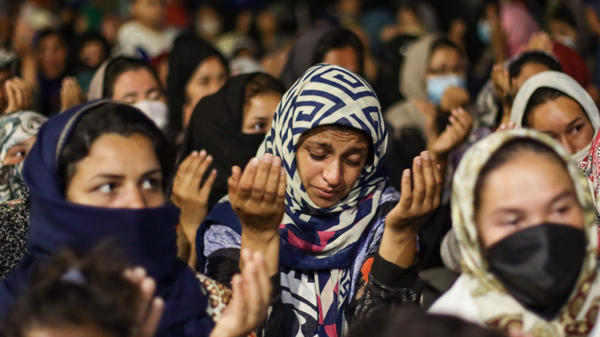 Women Refugees Pray On The Roads Of Lesbos Island