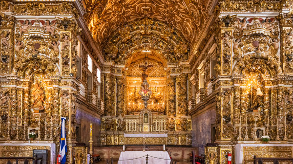The Baroque architecture of Convento de Sao Francisco Church in Salvador, BA, Brazil with its altars, walls, and images covered with 24k gold