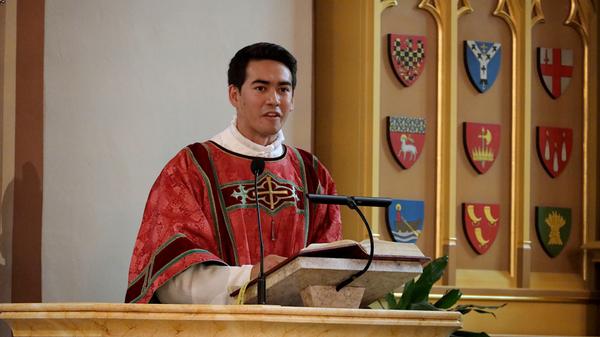 Deacon Mathias Bruno Ledum addresses congregation at his ordination in Oslo, Norway