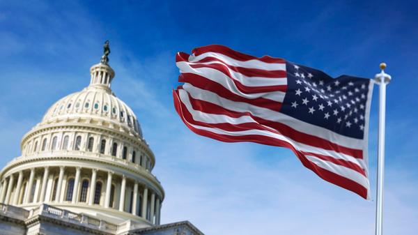 US Flag over Capital Hill