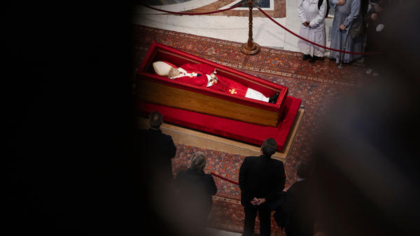 People pay their respects to late Pope Francis as he lies in state at St Peter's Basilica in The Vatican, on April 24, 2025.