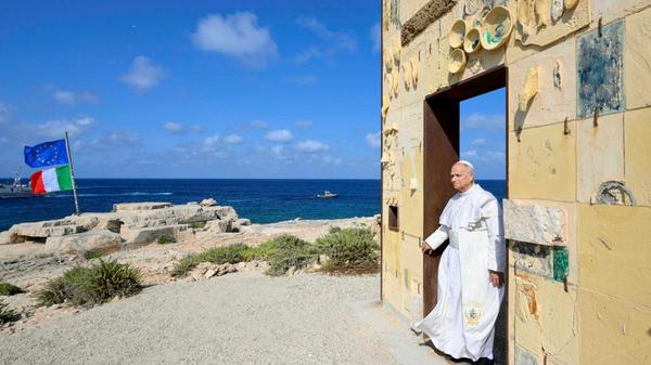 Pope Leo XIV walking through the arch of the monument Door of Europe - Porta d'Europa made by the italian artist Mimmo Paladino during a one day visit to Lampedusa island, south of Sicily.