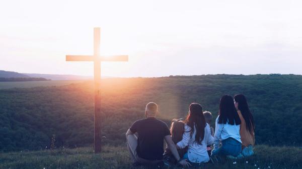 People around the cross