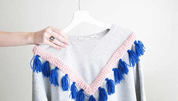 Le sweat à pompons