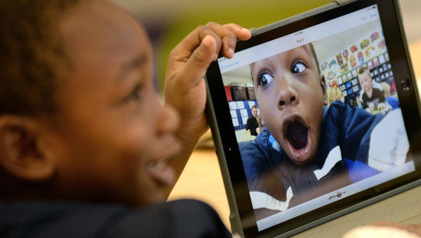 YOUNG SCHOOL BOY IPAD