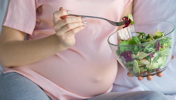 Pregnant Woman Eating