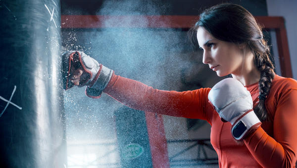 WOMAN,BOXING,PUNCHING BAG