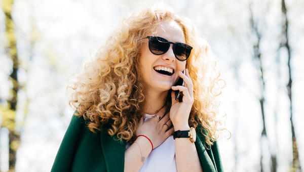 WOMAN TALKING ON PHONE