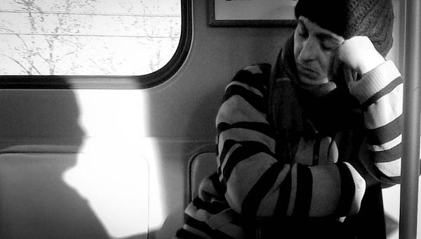 WOMAN ON TRAIN