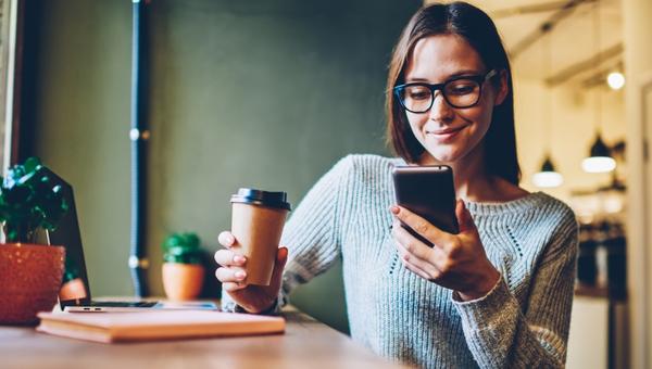 WOMAN READING NEWS