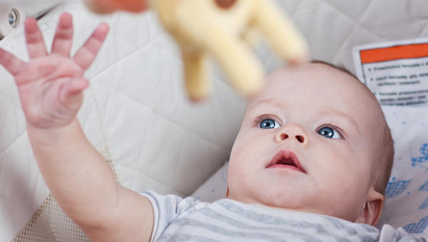 baby boy in a cradle