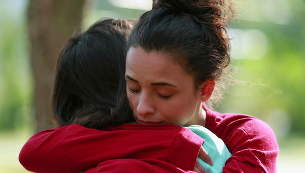 FRIENDS HUGGING EACH OTHER,