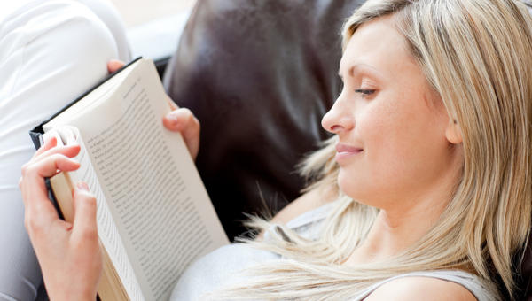 WOMAN READING,