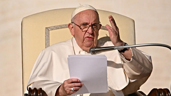 Pope-Francis-waves-as-he-arrives-for-the-weekly-general-audience-AFP