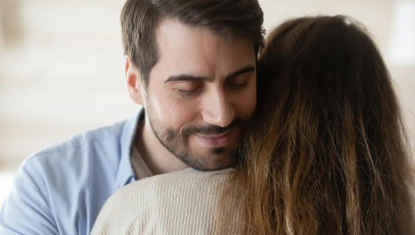 Couple hug forgive