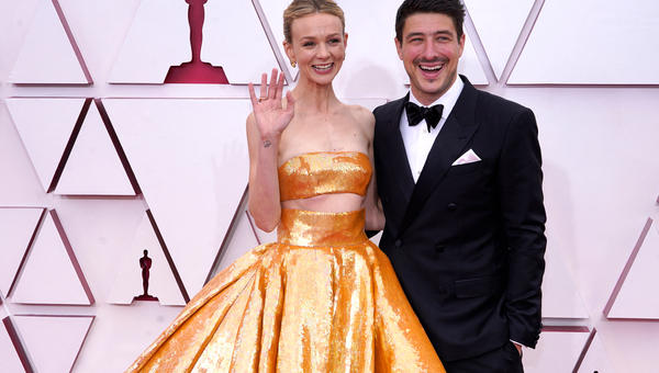 British actress Carey Mulligan (L) and husband US-British musician Marcus Mumford