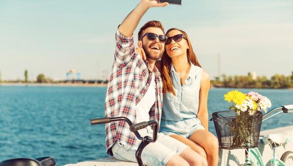 young couple making selfie