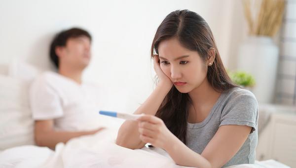 couple in bedroom, infertility