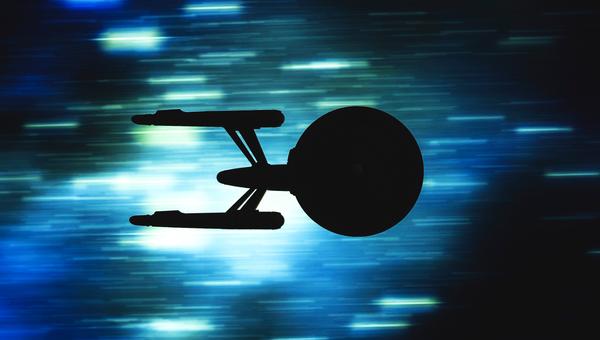 Model of Starship Enterprise traveling in space