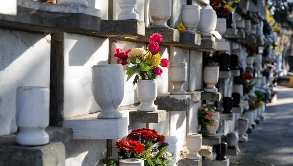 Urns on columbarium in cemetery