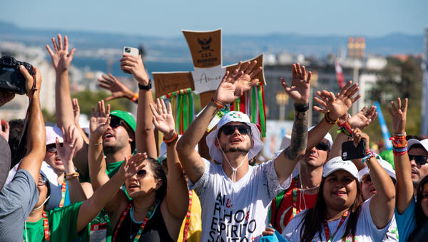Pilgrims attend the opening mass of the World Youth Day 2023