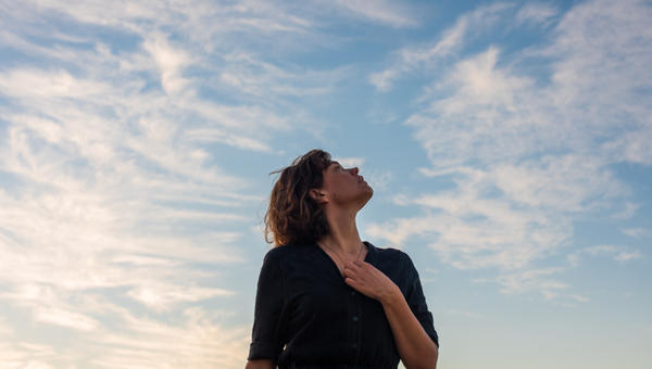 SKY-WOMAN-shutterstock_1981074752