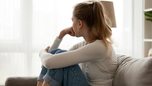 woman sitting and thinking