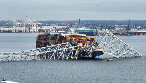 Francis Scott Key Bridge sits on top of a container ship after the bridge collapsed, Baltimore, Maryland
