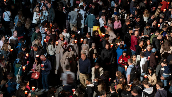 A general view shows people gathering at the Colosseum before the Way of the Cross (Via Crucis
