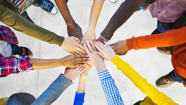 Teamwork all hands in center