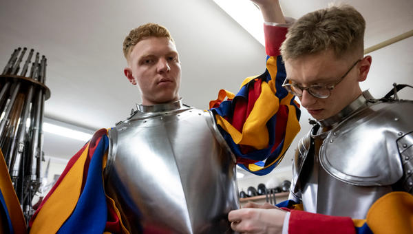 Swiss Guards get ready in the Vatican Armory at the Pontifical Swiss Guard headquarters, prior the swearing-in ceremony of new Swiss Guard recruits at the Vatican, on May 6, 2024