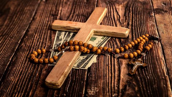 Cross with Rosary and money