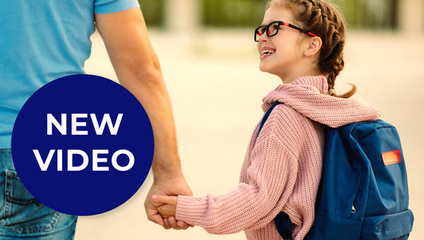 Dad taking daughter to school