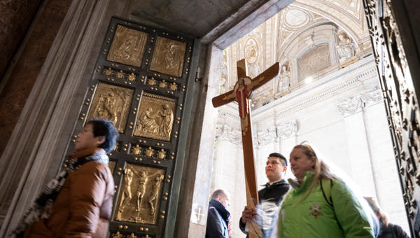 Groups of pilgrims enter St Peter's Basilica through the Holy Door a day after Pope Francis opened it for the start of the Catholic Jubilee Year 2025, in the Vatican on December 25, 2024.