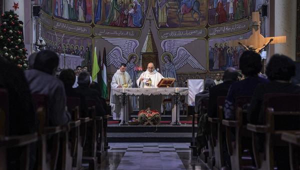 Fr. Gabriel Romanelli celebrates Mass at Holy Family in Gaza