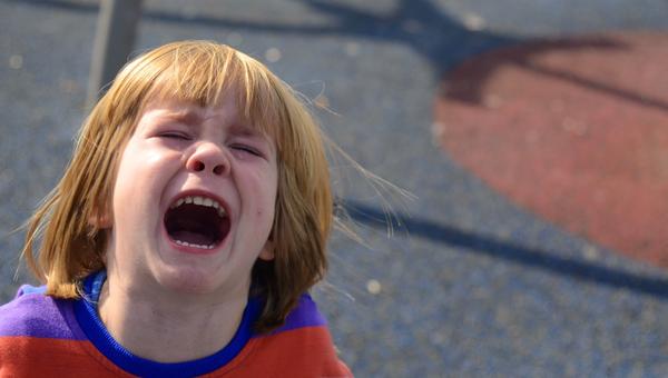 The little boy is screaming, crying a lot. Children's whims, tantrums