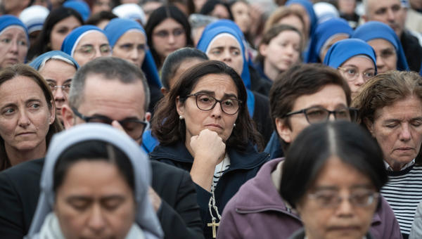 Devotees attend a Rosary in homage to Pope Francis following his death in Saint Peter's Square, the Vatican, on April 21, 2025