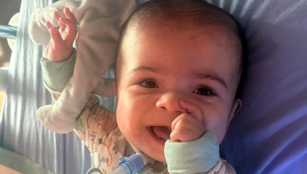 Baby sucking thumb.