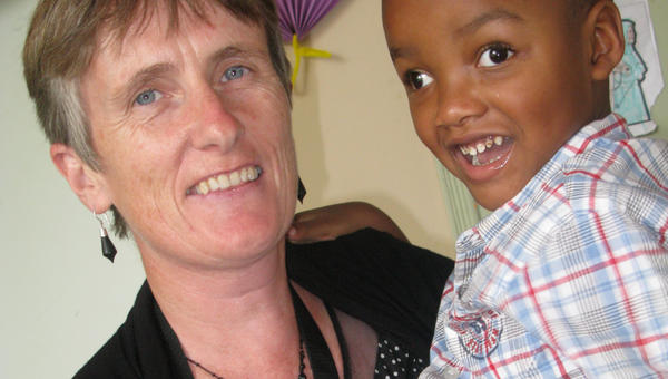 Woman holding child